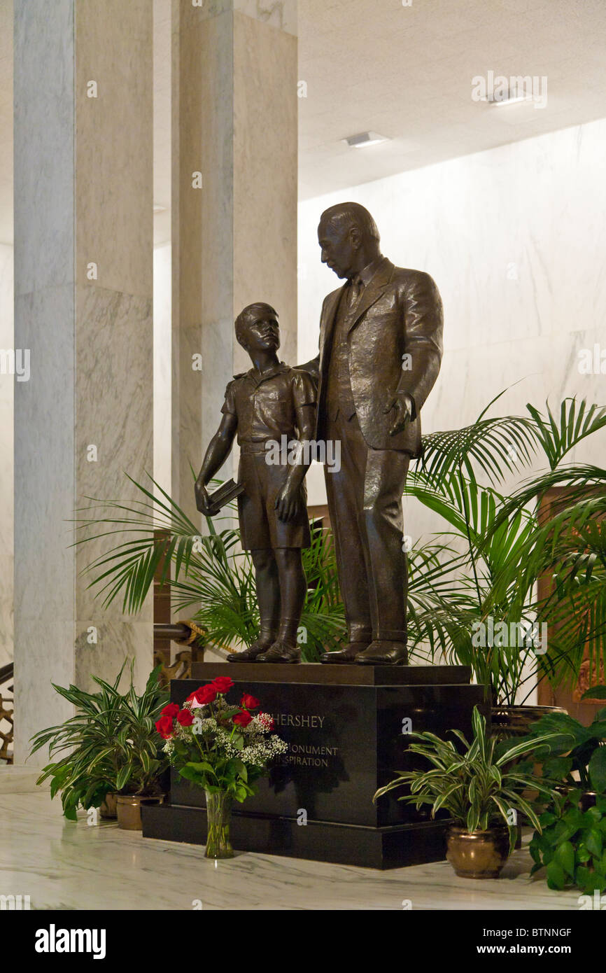 Statue of Milton Hershey and a student in Founders Hall at the Milton Hershey School in Hershey Pennsylvania Stock Photo