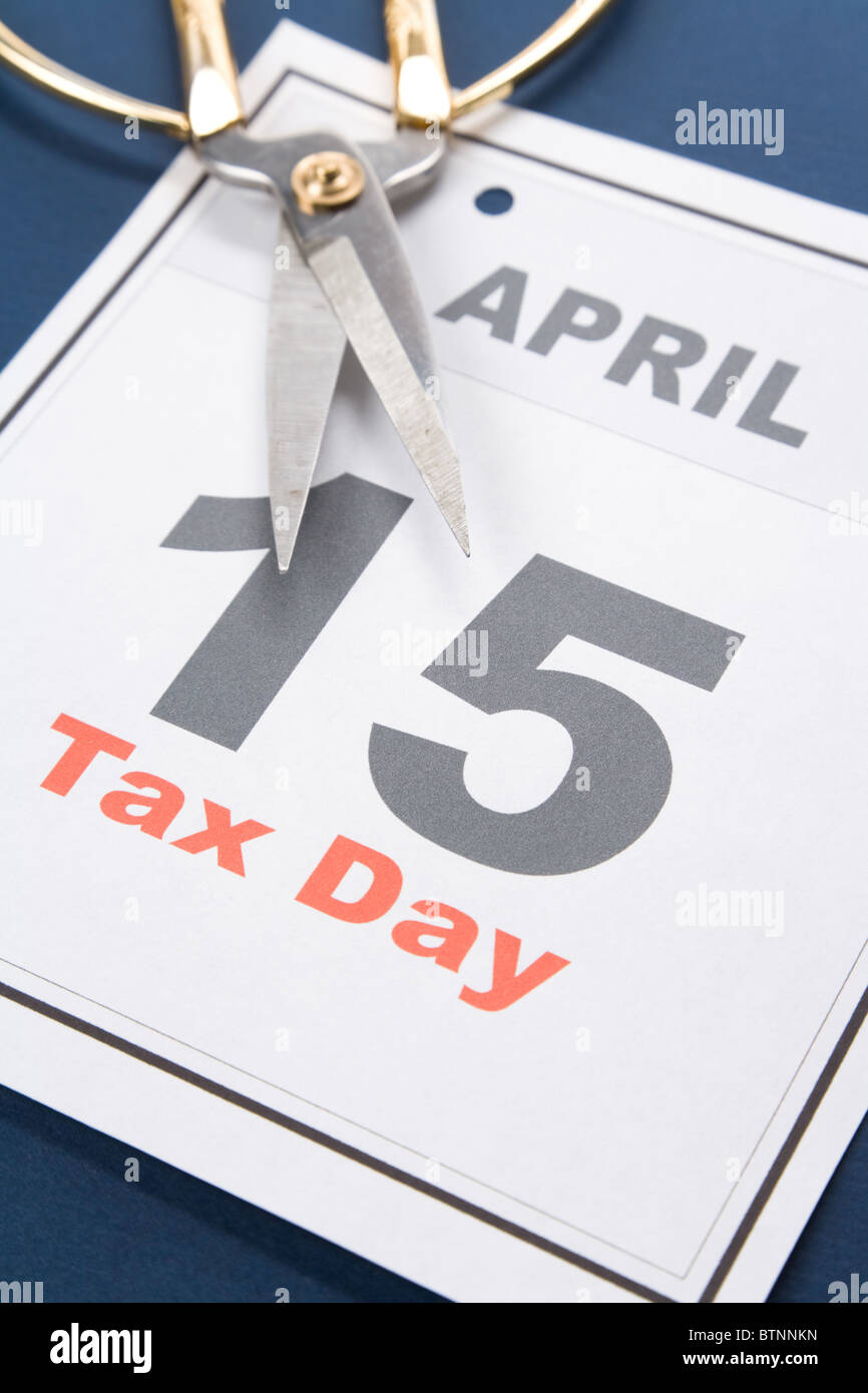 Tax Day, calendar date April 15, concept of tax cut Stock Photo