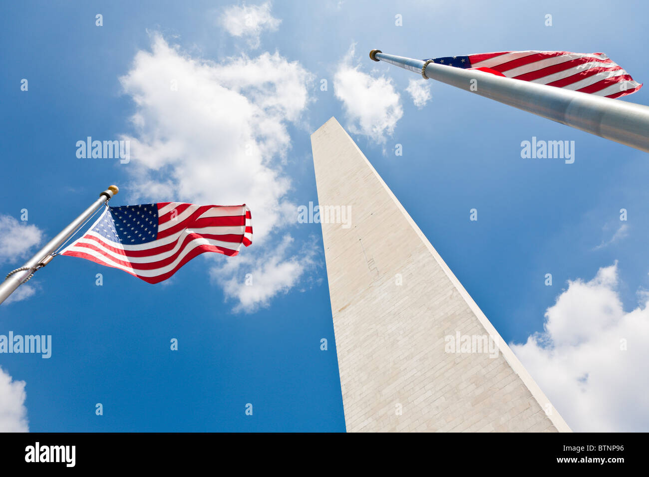 Washington DC - Sep 2009 - American flags at base of the Washington Monument in Washington DC Stock Photo
