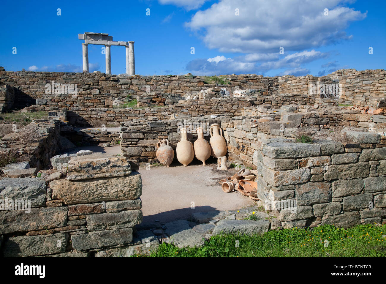 Ancient pottery wine amphora found in the ruins on the island of Delos, Greece. Stock Photo