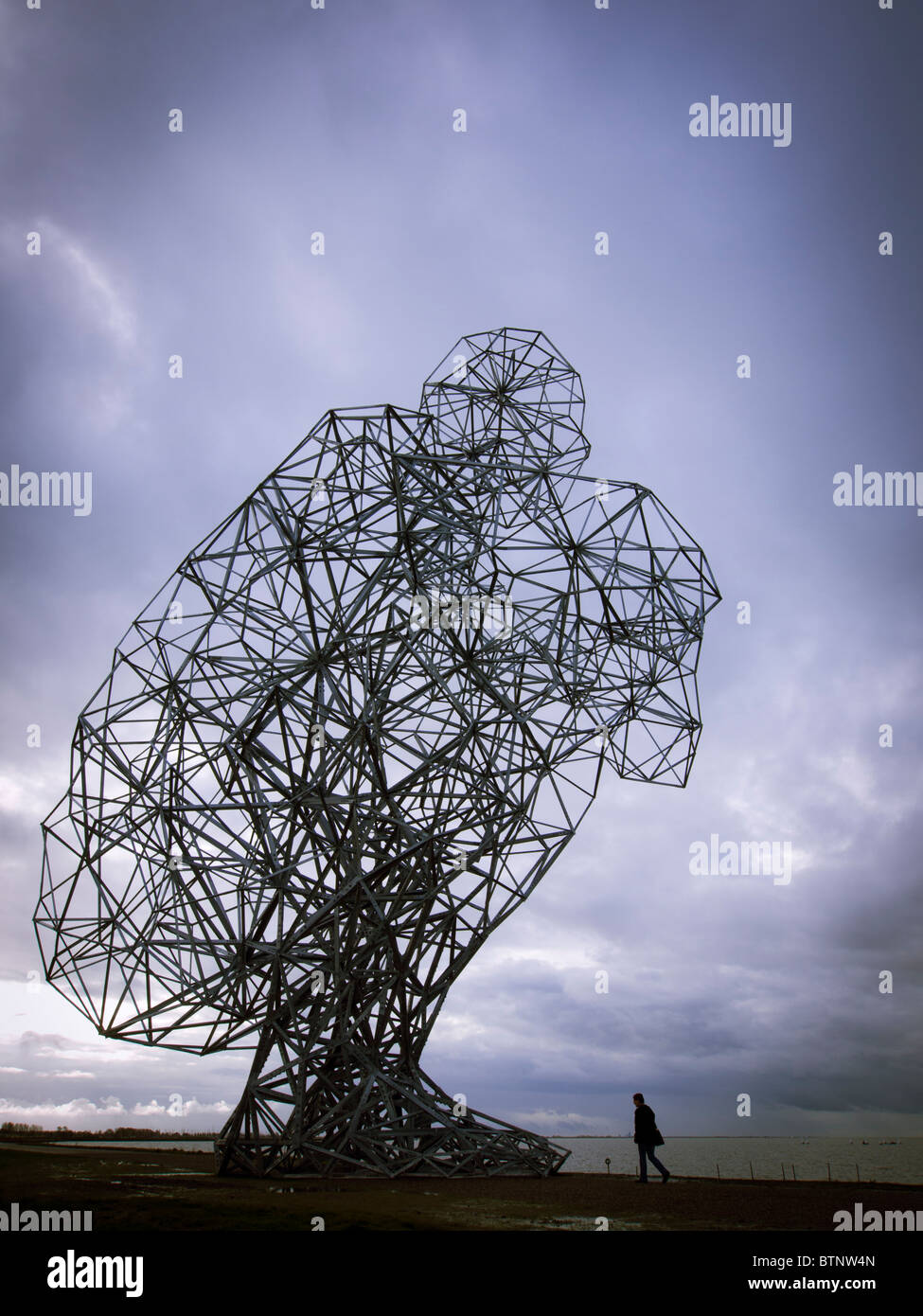 Antony Gormley's new sculpture called Exposure on sea dyke at Lelystad