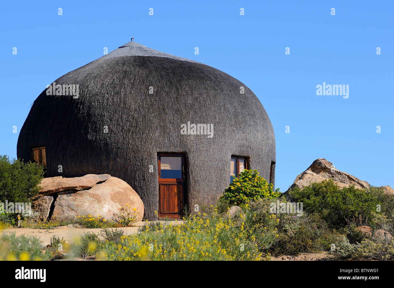Namakwa Mountain Suite in the shape of a traditional hut of the Nama people, Naries Namakwa Retreat, Naries, South Africa Stock Photo