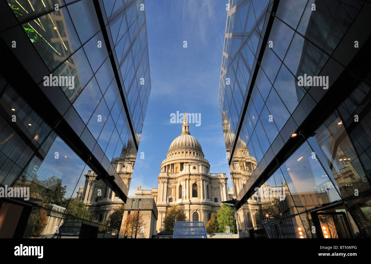 St Paul's cathedral reflected in One New Change shopping centre, London United Kingdom Stock Photo
