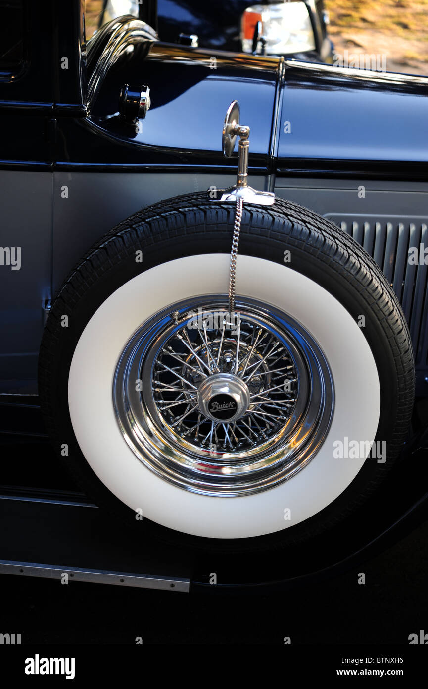 White sidewall spare tire atop running board of restored 1927 Buick first owned by Al Capone Stock Photo