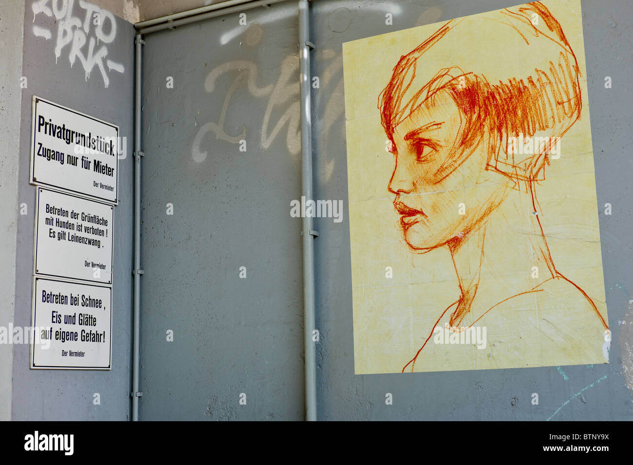 Poster art showing a the portrait of a woman with short hair, Berlin-Mitte, Germany Stock Photo