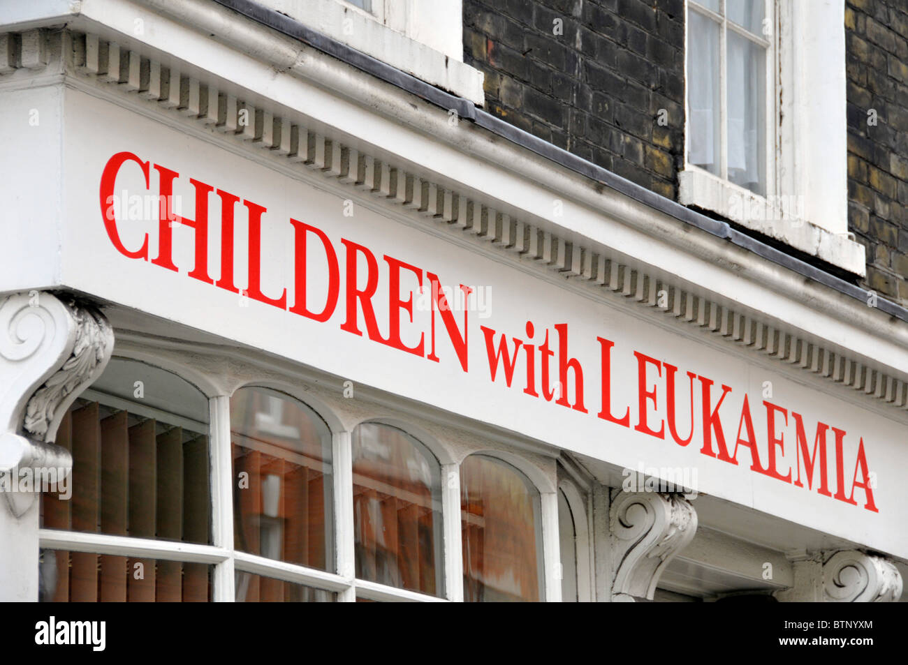 Sign above London offices of the charity Children with Leukaemia in Great Ormond Street London England UK Stock Photo