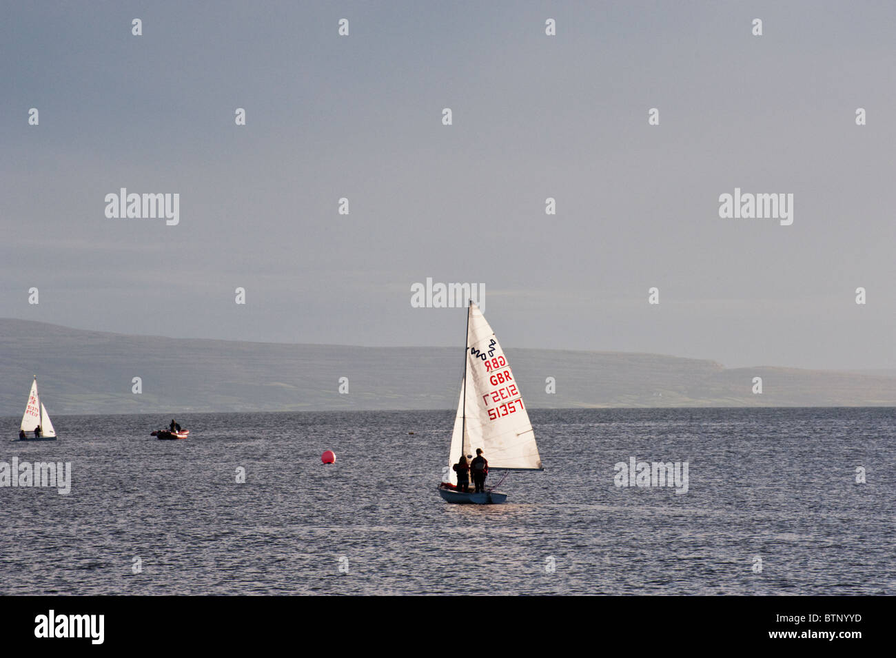 Sailing mirror class sailboats near Galway, Ireland Stock Photo Alamy