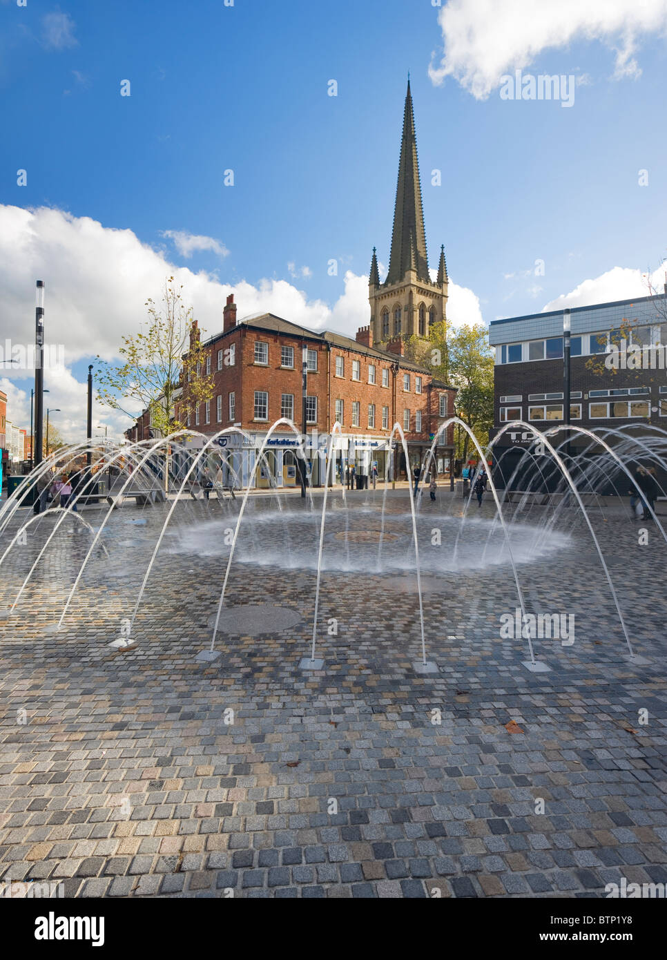 Wakefield City Centre view toward Wakefiel Cathedral with ornamental fountains in foreground Wakefield West Yorkshire U.K Stock Photo