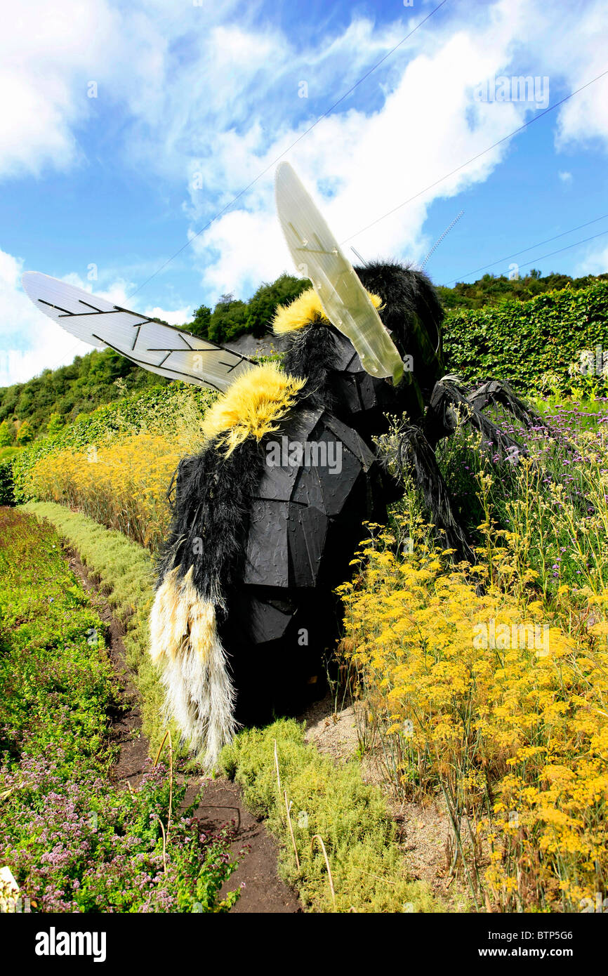 Huge sculpture of a Bumblebee in the 'Pollenation Garden' at the Eden Project Cornwall Stock Photo