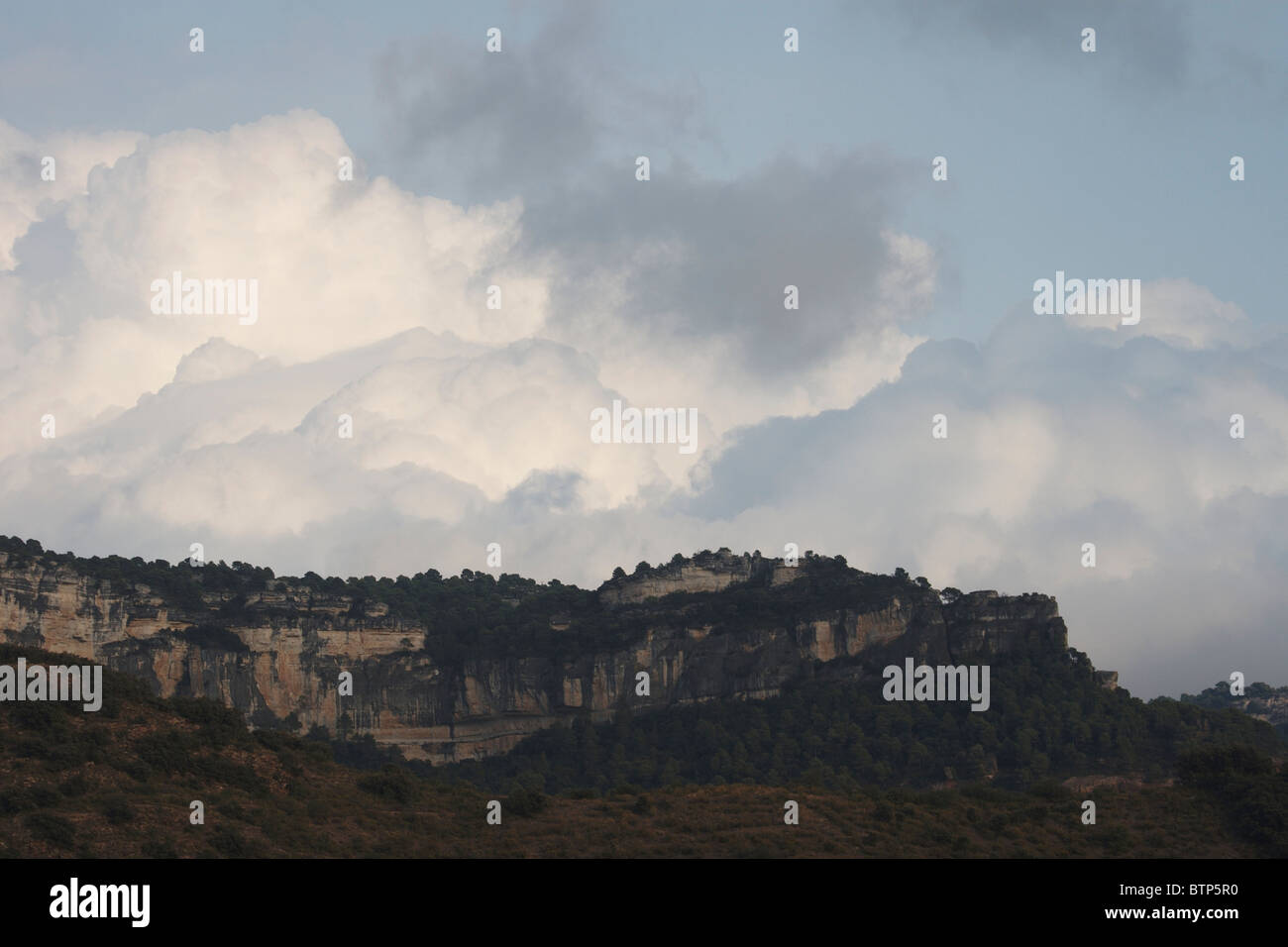 Spain, Catalunya, Priorat, View of mountain with cloudy sky Stock Photo