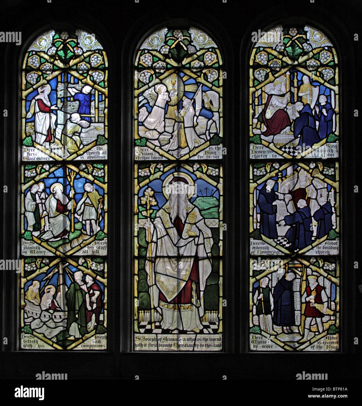 A stained glass window by Frederick Charles Eden depicting scenes from the putative life of Joseph of Arimathea; Longbridge Deverill, Wiltshire Stock Photo