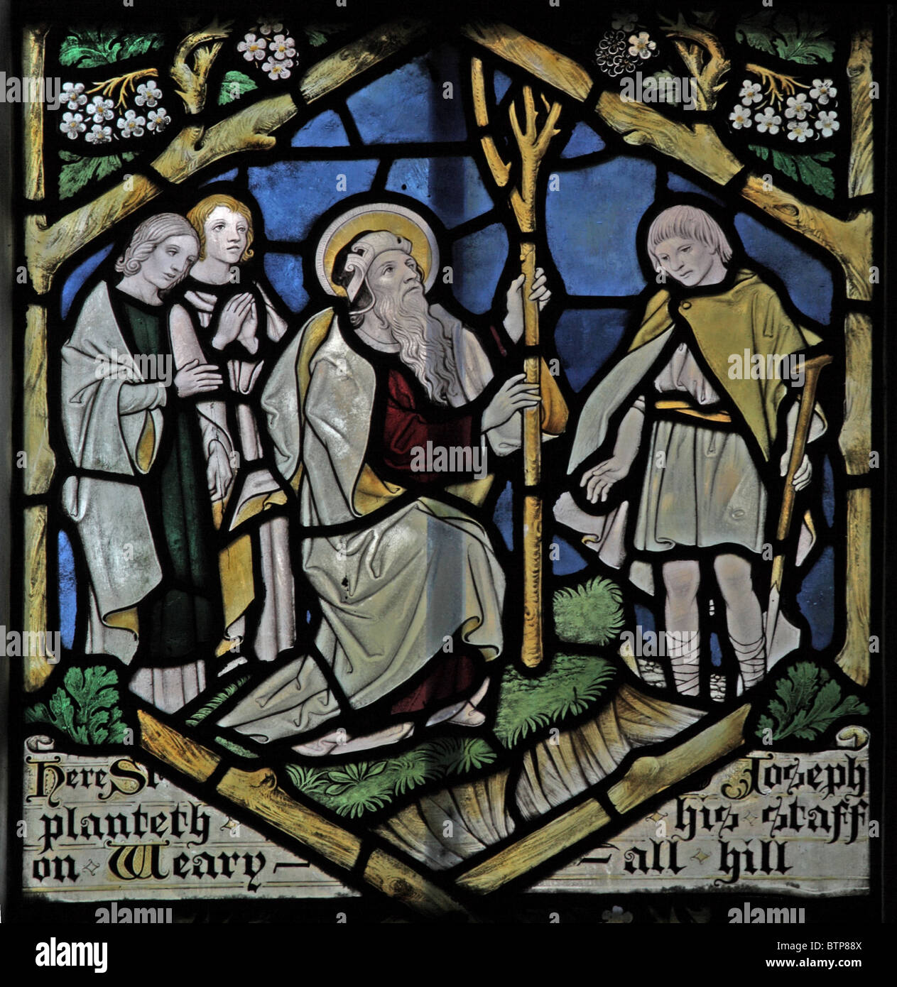 A stained glass window depicting scenes from the putative life of Joseph of Arimathea at Glastonbury by F C Eden (c1909-c1944). Longbridge Deverill Stock Photo