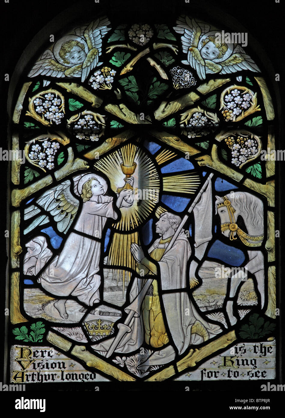 A stained glass window by Frederick Charles Eden depicting scenes from the putative life of Joseph of Arimathea (the story of Glastonbury) Stock Photo