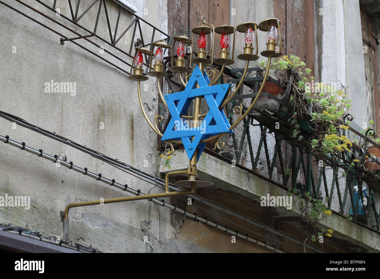 Jewish Menorah lights with Star of David sign in Venice's Jewish quarter Stock Photo