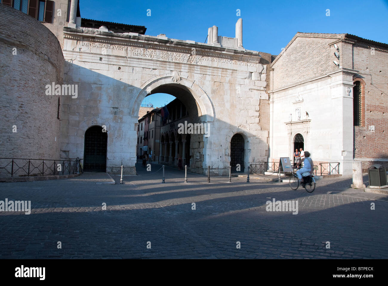Arch of Augustus Fano, Italy and the adjacent church of San Michele Stock Photo