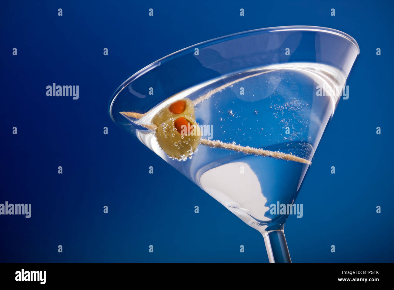Martini with olive Stock Photo