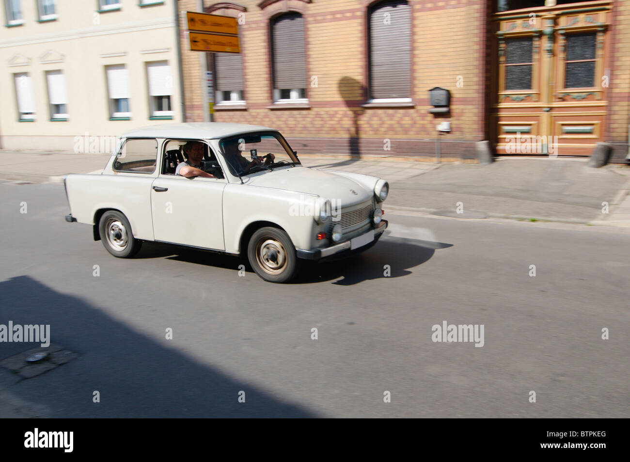 Germany, Brandenburg, Lübbenau, Trabant car moving on street Stock Photo