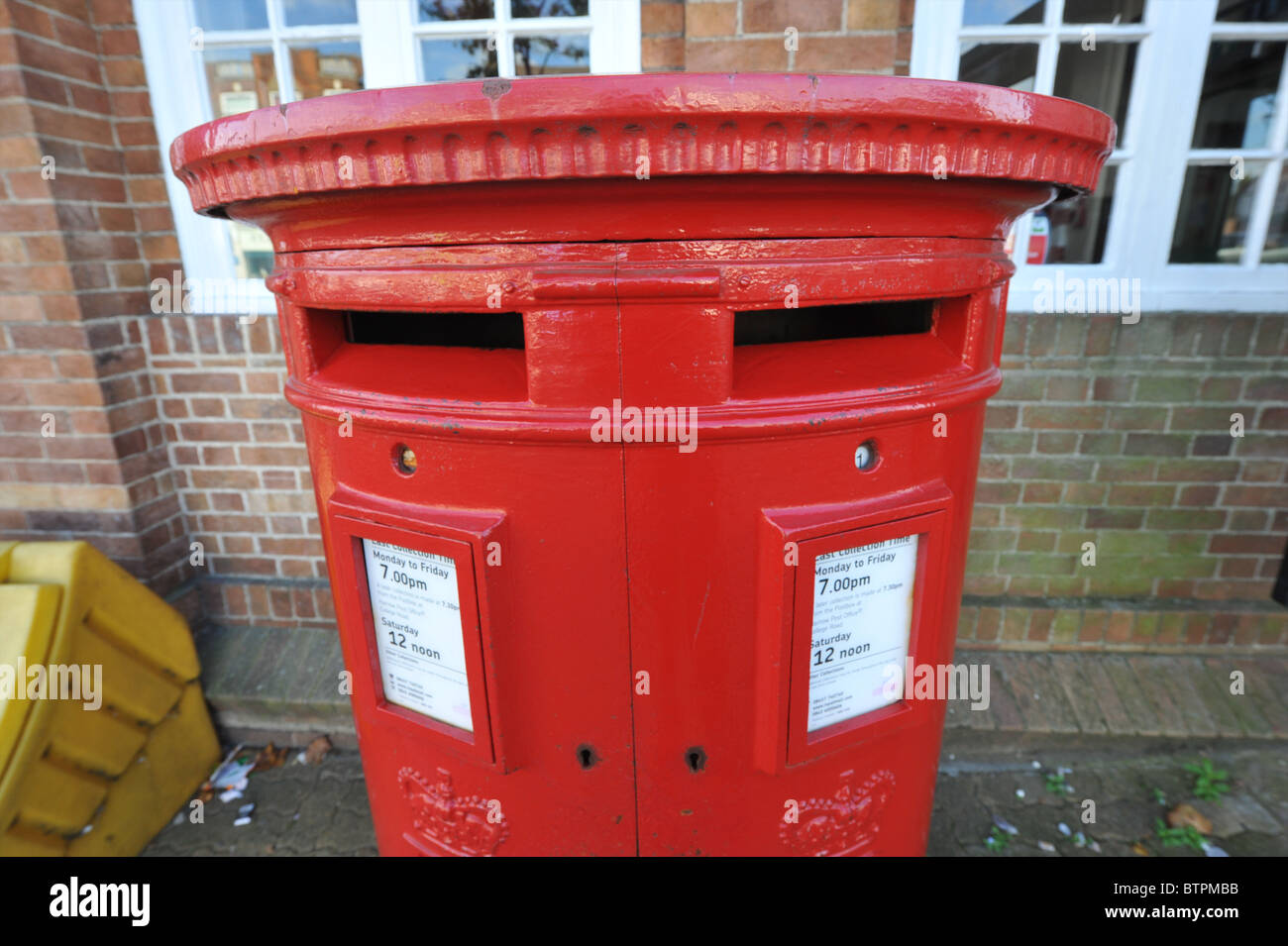 Dual Letterbox, Last collection time 7pm Stock Photo Alamy