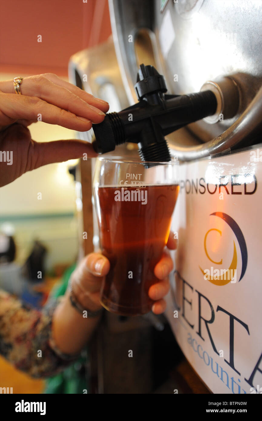 Pouring a pint of beer from a cask Stock Photo