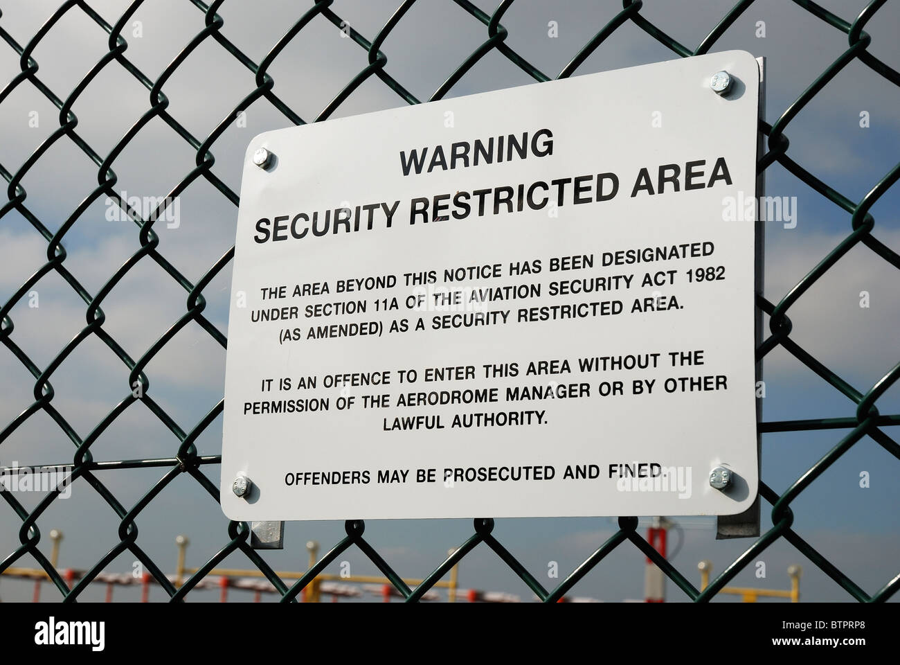 airport security restricted area sign england uk Stock Photo - Alamy