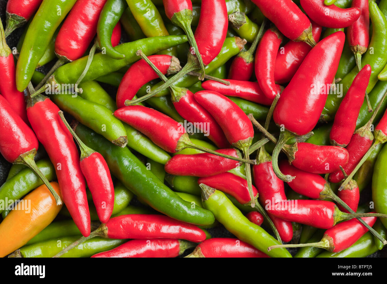 Colorful chilli peppers hi-res stock photography and images - Alamy