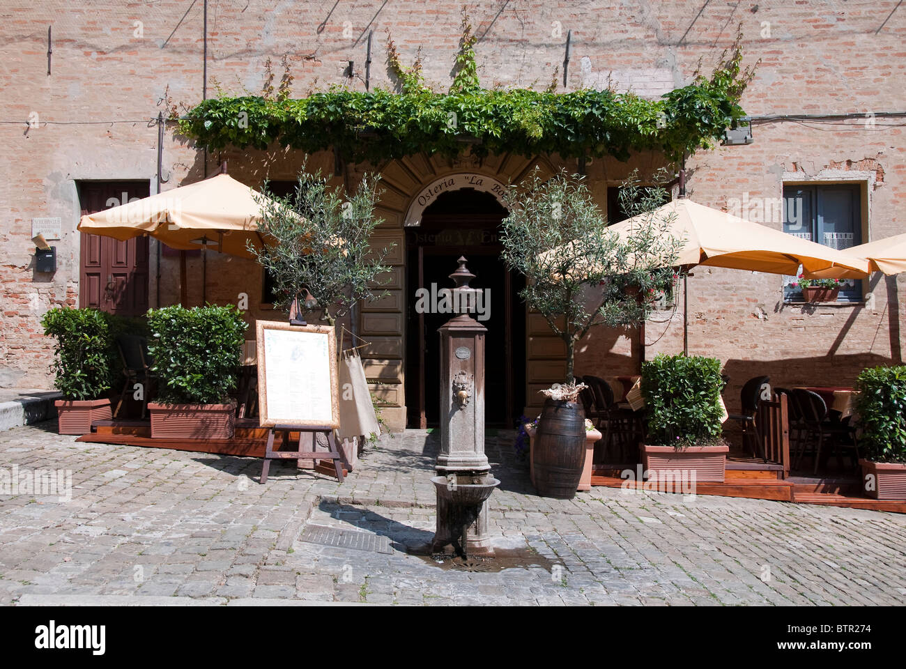 Restaurant in the main street of Gradara Castle, Pesaro Urbino Province, Le Marche Stock Photo