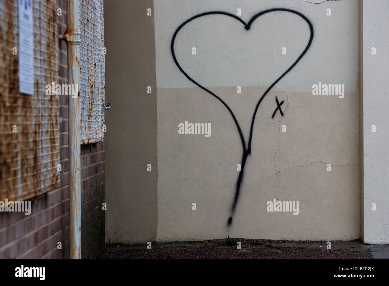 Heart graffiti on a wall in Brighton, East Sussex, UK. Stock Photo