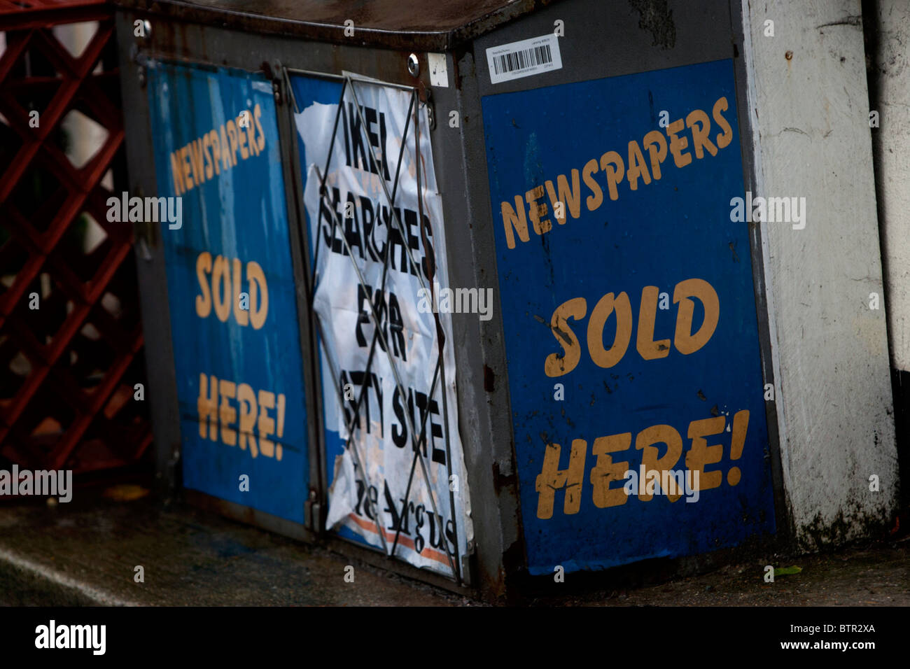 Newsagents Sign Newspapers Sold Here sign outside a newsagents Brighton, East Sussex ...