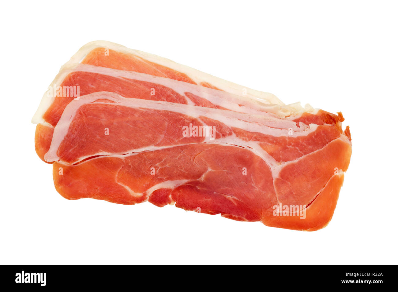 three slices of spanish dry-cured serrano ham Stock Photo