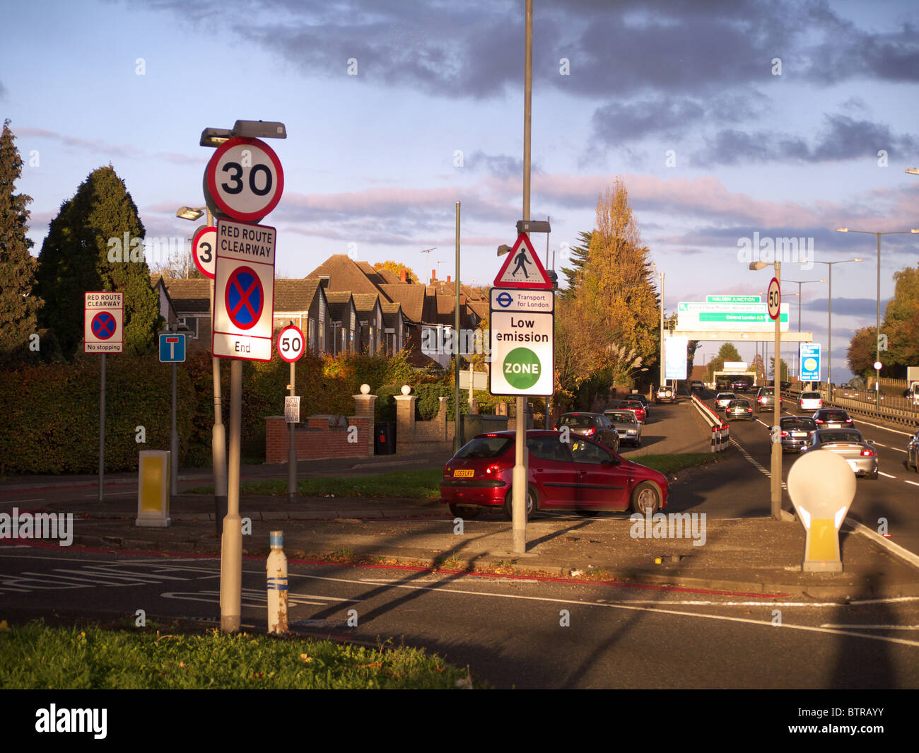 Multiple road signs on a slip road in New Malden London. Stock Photo