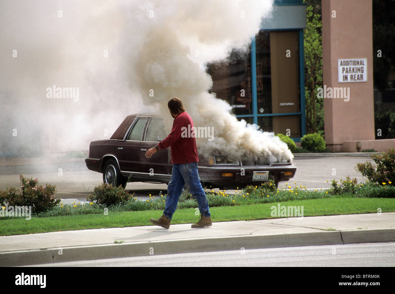 car fire smoke emergency 9-1-1 excitement insurance damage firefighter response Stock Photo