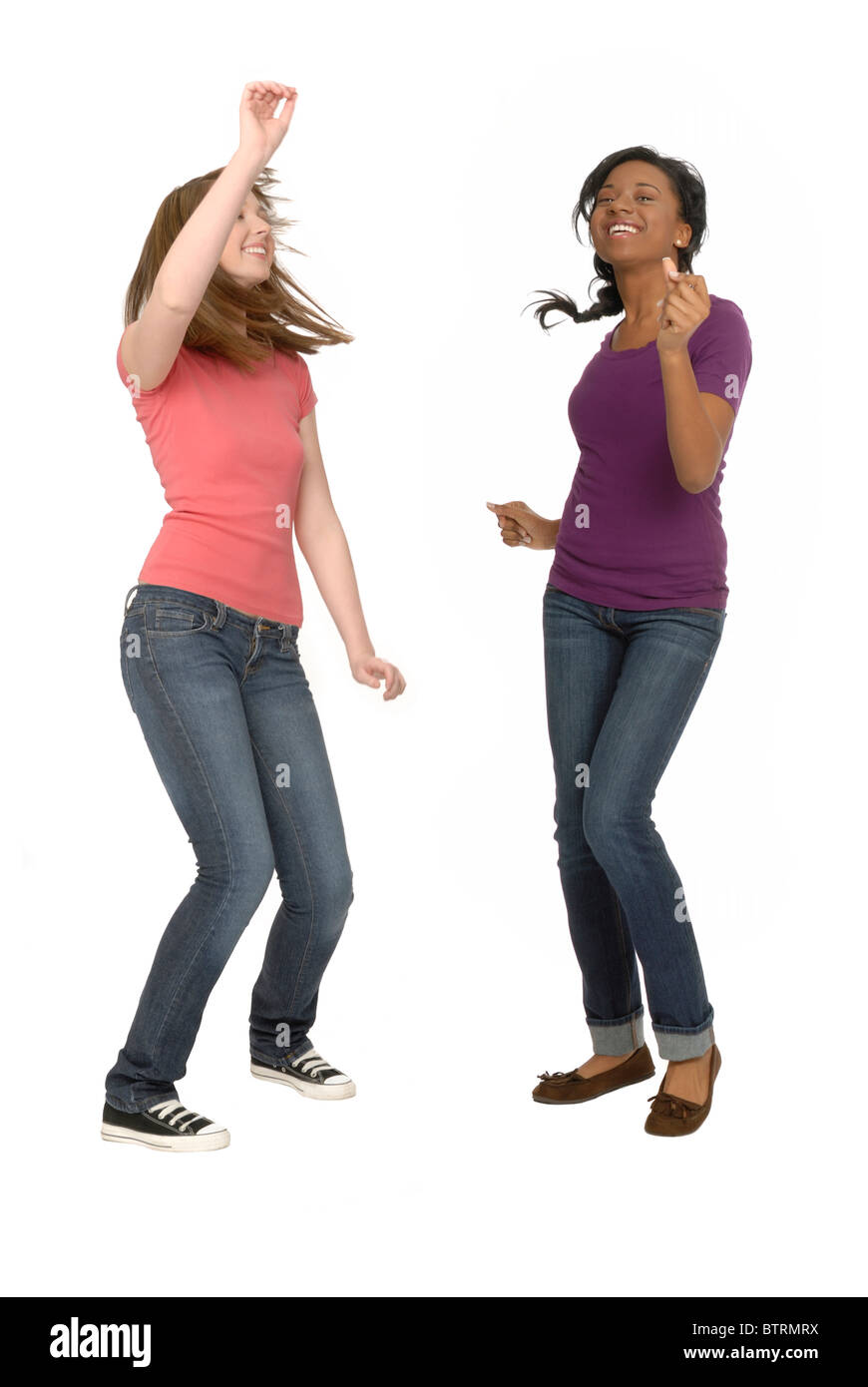 Two teenage girls dancing. Stock Photo