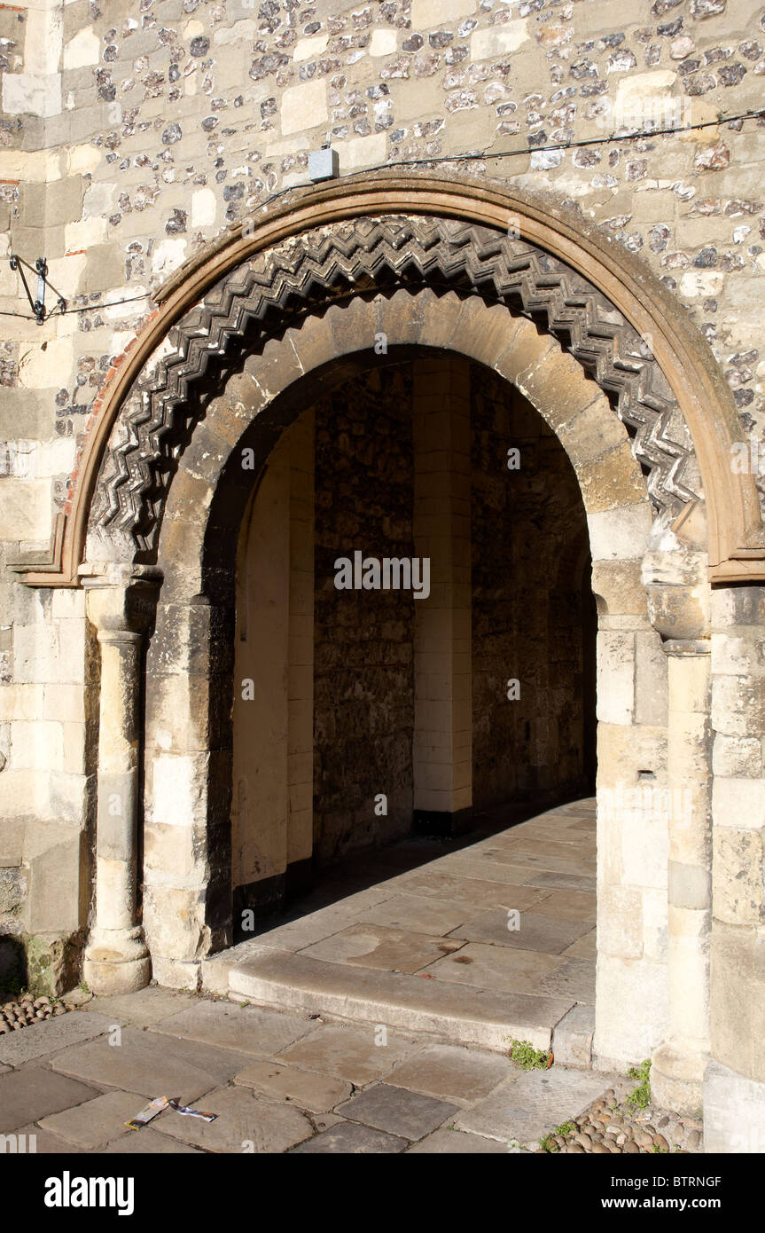 Norman round arch with dogtooth decorative stonework - the last remaining part of the demolished St Maurice's church, Winchester Stock Photo