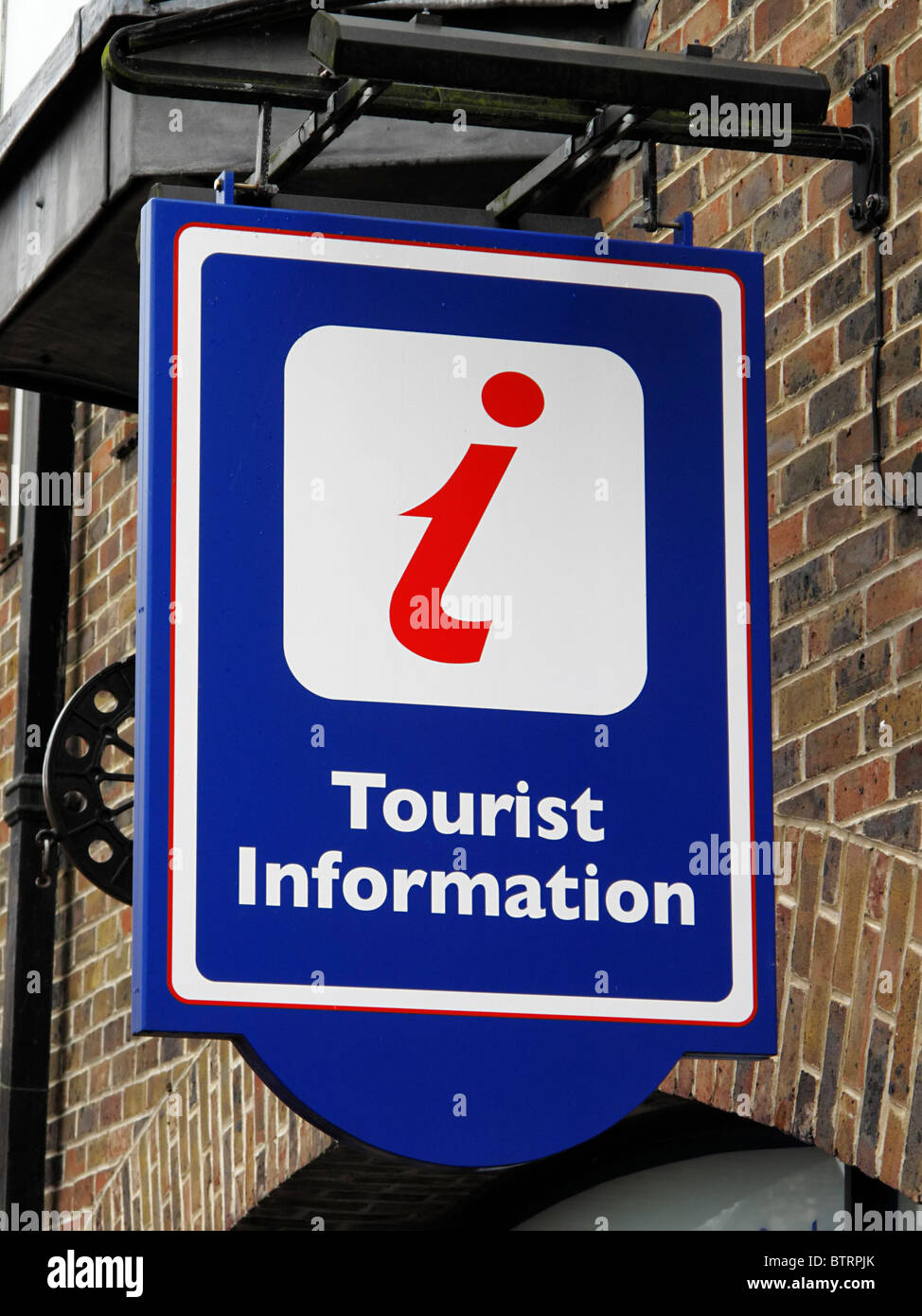 Hanging tourist information sign Stock Photo