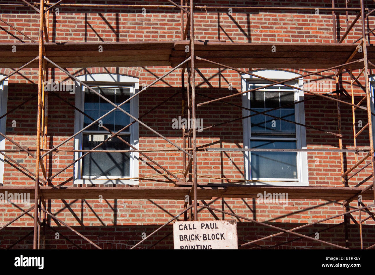 Brick Building under Repair Stock Photo - Alamy