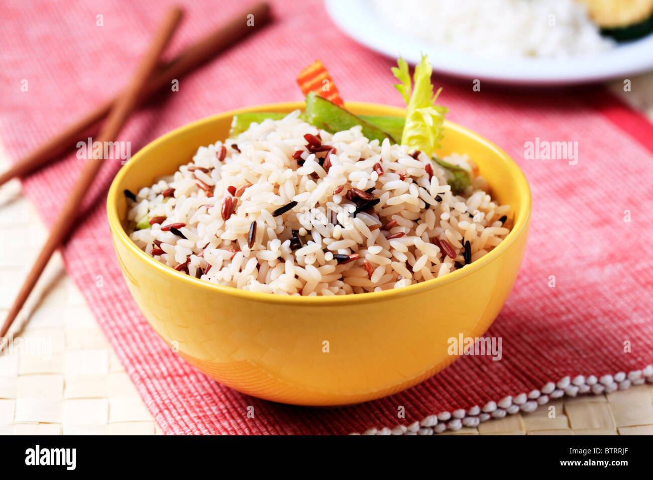 Bowl of cooked mixed rice Stock Photo Alamy