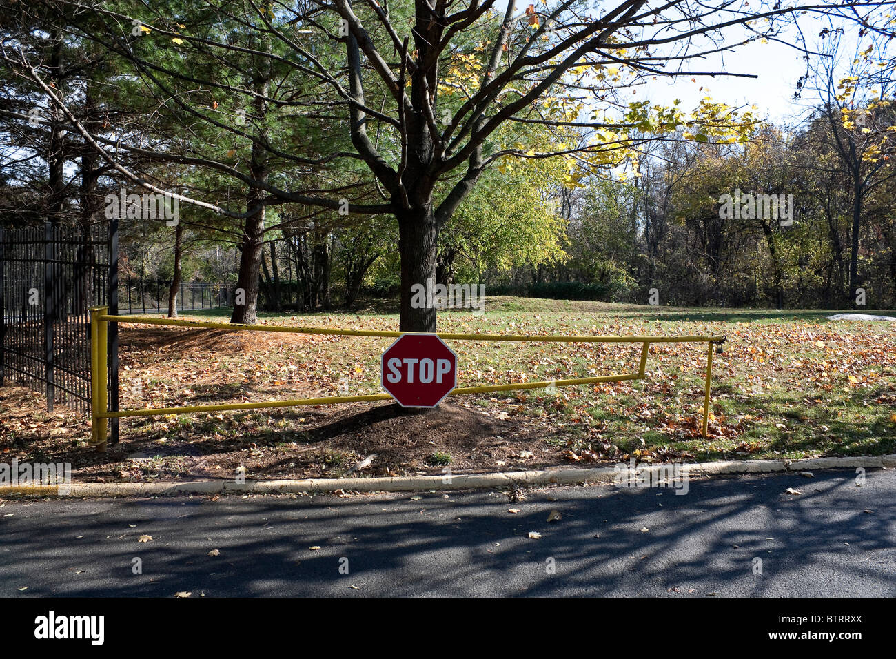 Entry Guide Stop Stop Sign on Entry Gates Stock Photo - Alamy