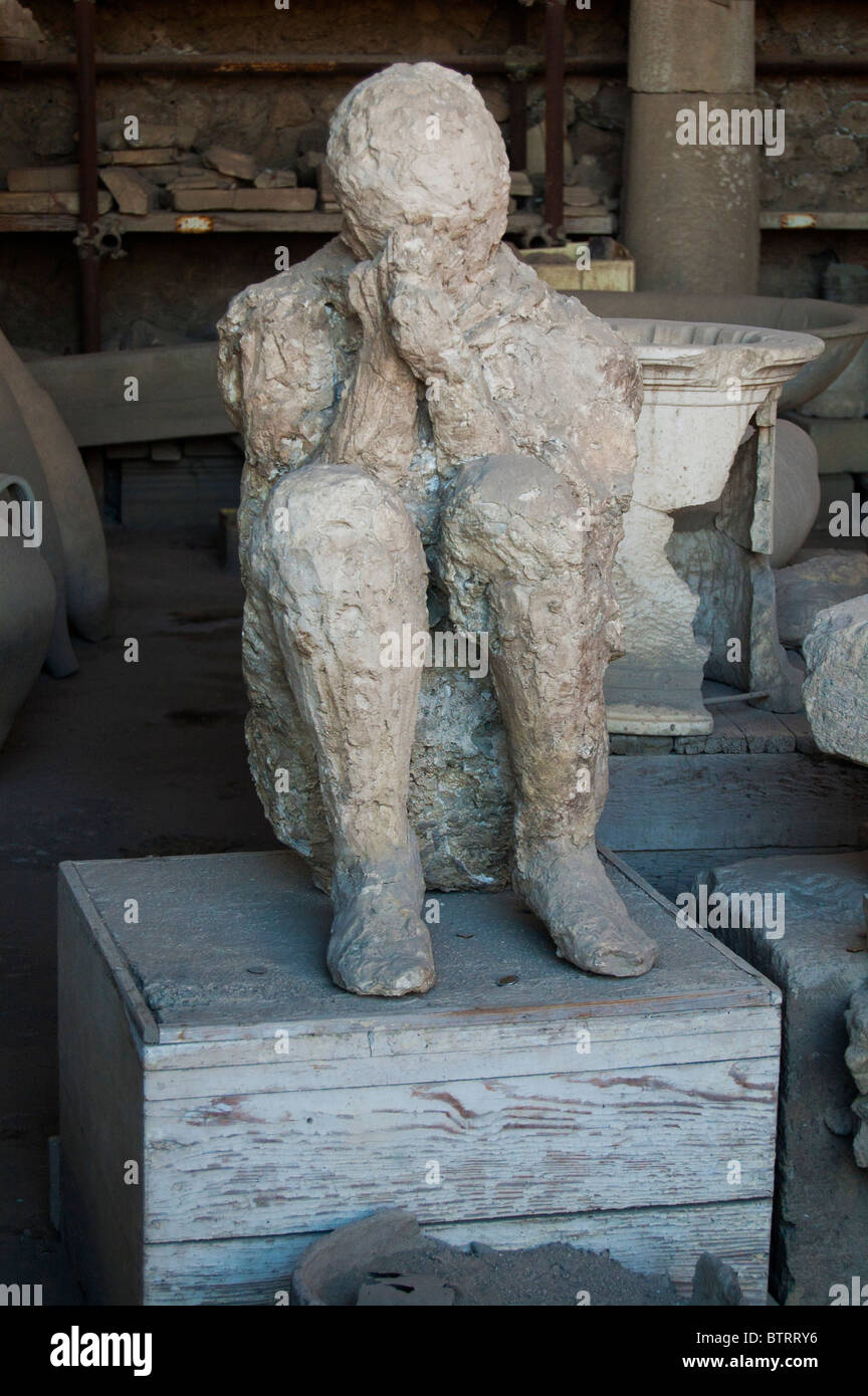 Plaster Cast of Crying Boy by Mount Vesuvius, Pompeii, Italy Stock Photo