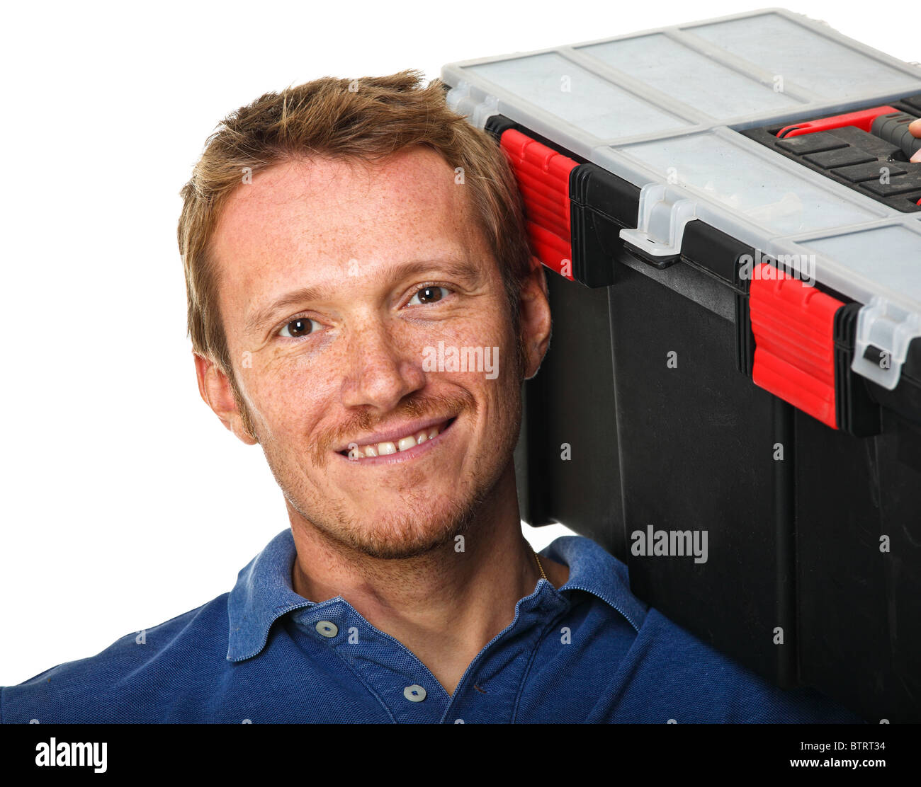 caucasian handyman with toolbox on his shoulder Stock Photo - Alamy