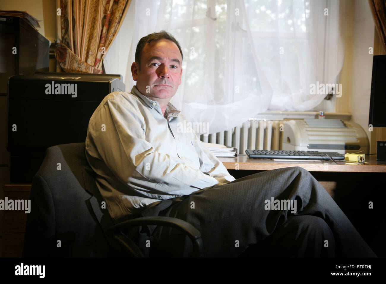 Labour MP Jon Crudass, in his office in Westminster, London UK. Stock Photo