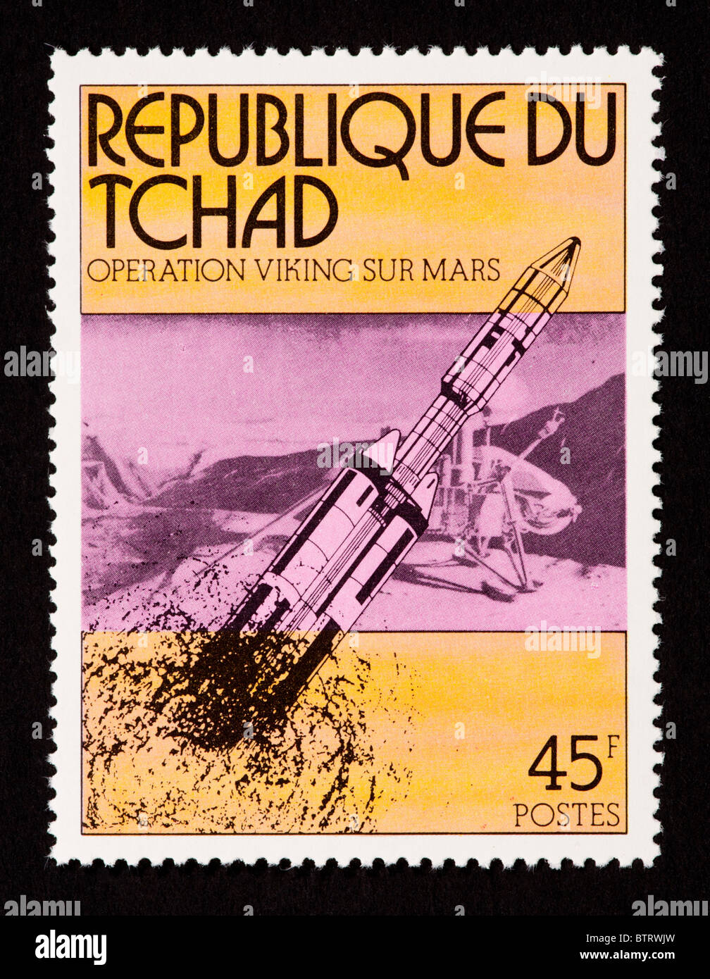 Postage stamp from Chad depicting 1976 Mars landing and Viking rocket. Stock Photo