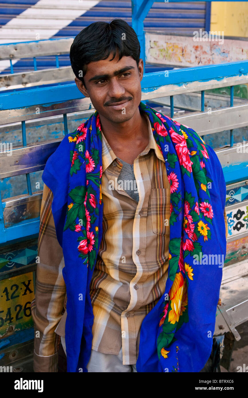 local cross eyed man poses for a picture in india Stock Photo - Alamy