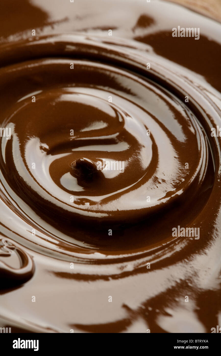 liquid dark chocolate, focus in the middle Stock Photo