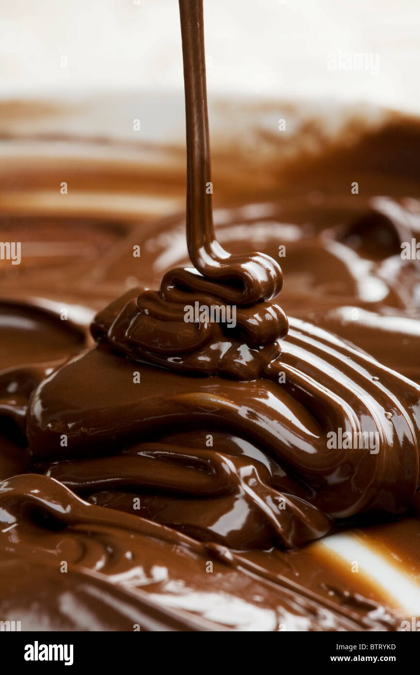 lots of chocolate falling from above Stock Photo