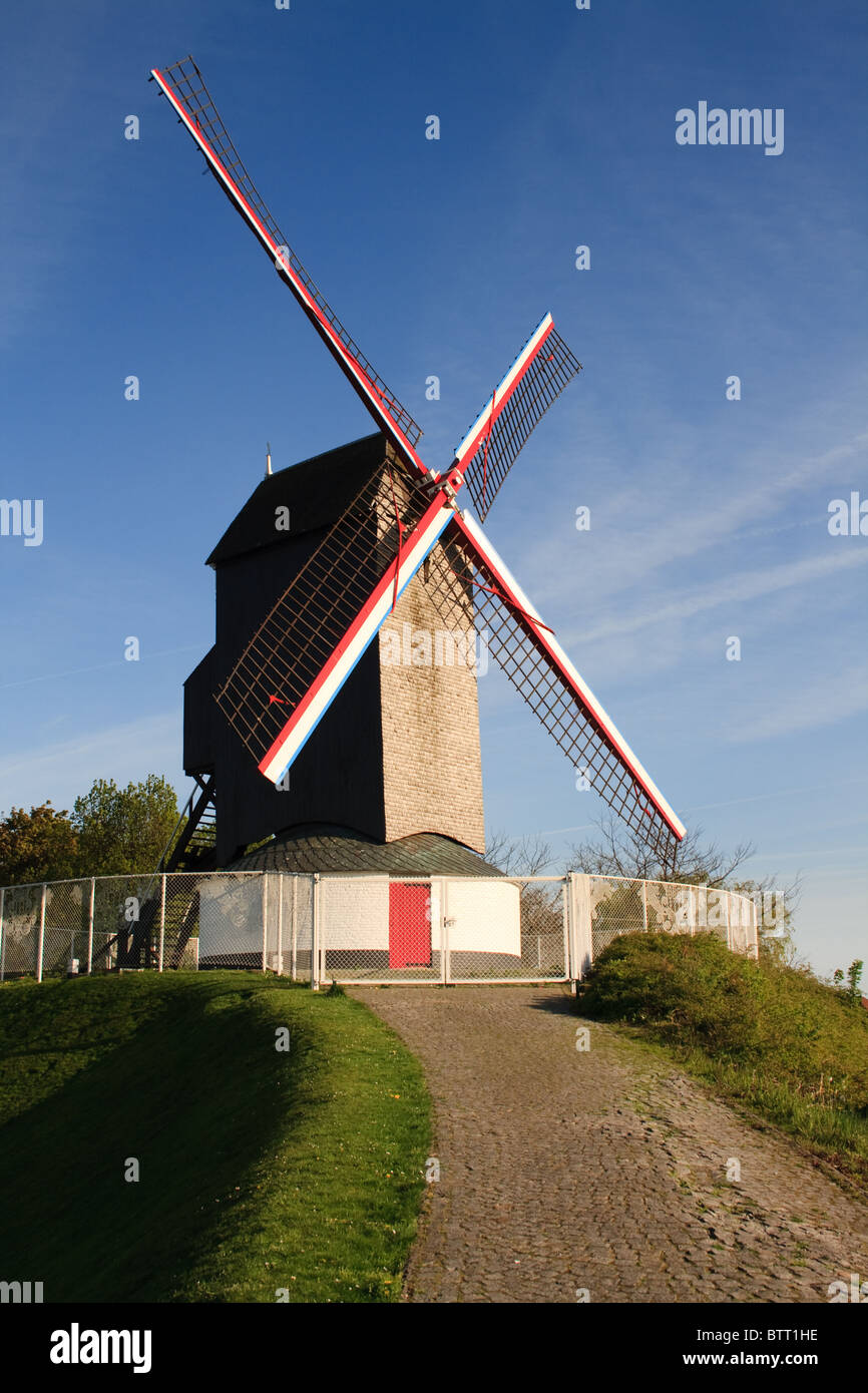 Windmill with a clear blue sky in Bruges, Belgium, Europe Stock Photo