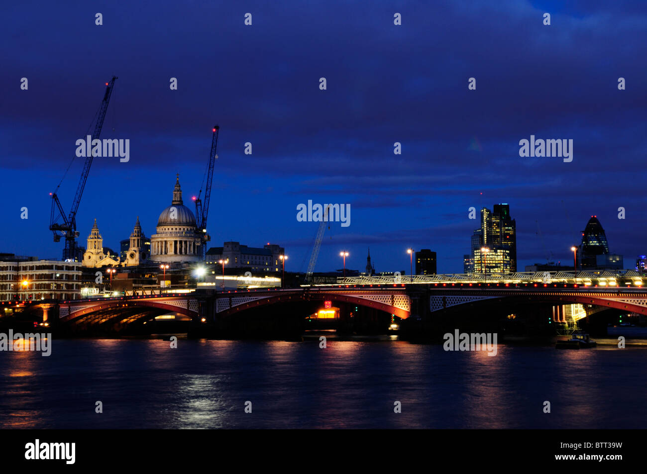 Blackfriars Bridge, St Paul's Cathedral and City of London Buildings at dusk, London, England, UK Stock Photo
