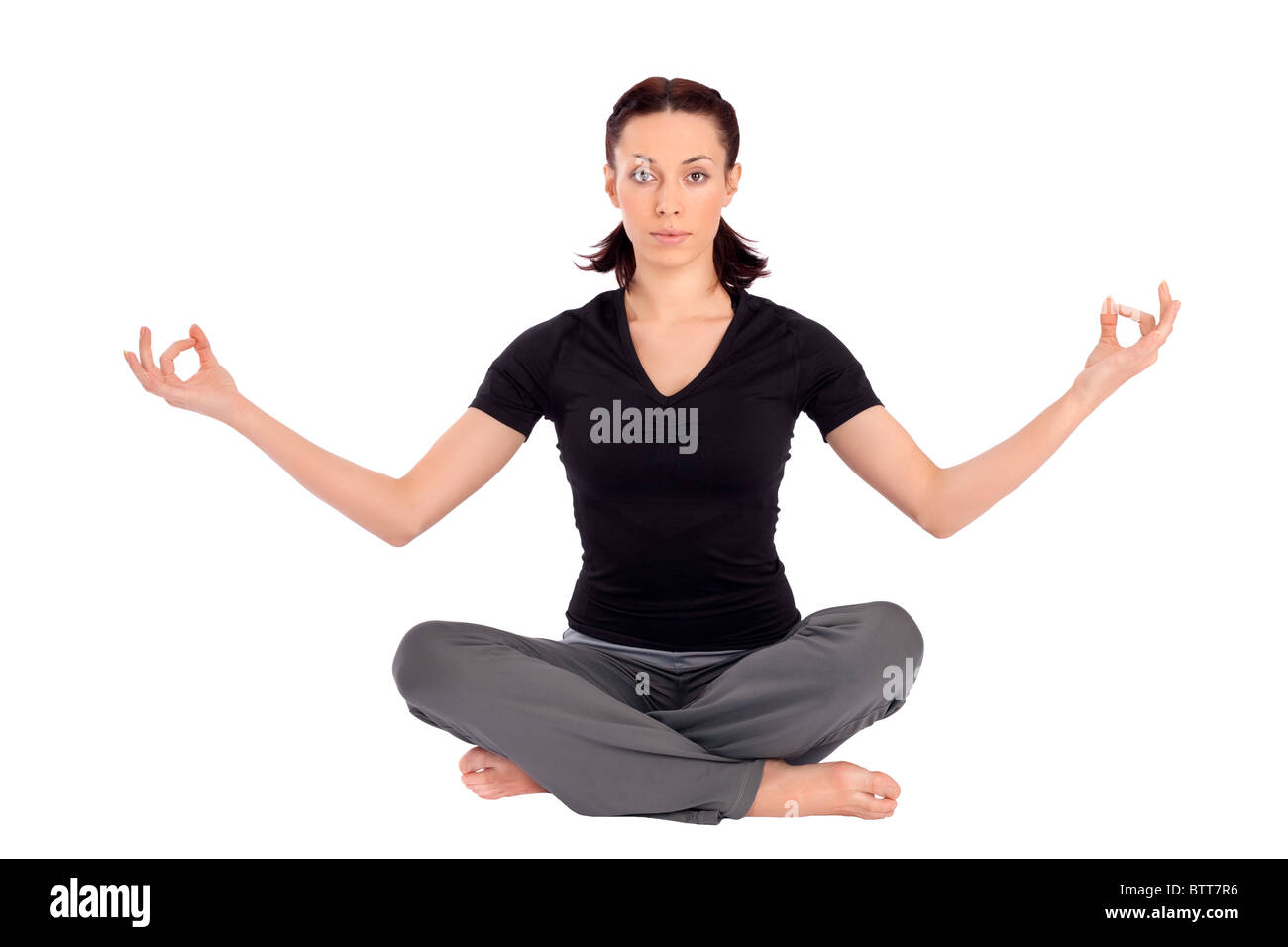 Young beautiful woman practicing breath control yoga asana, isolated on white background. Stock Photo