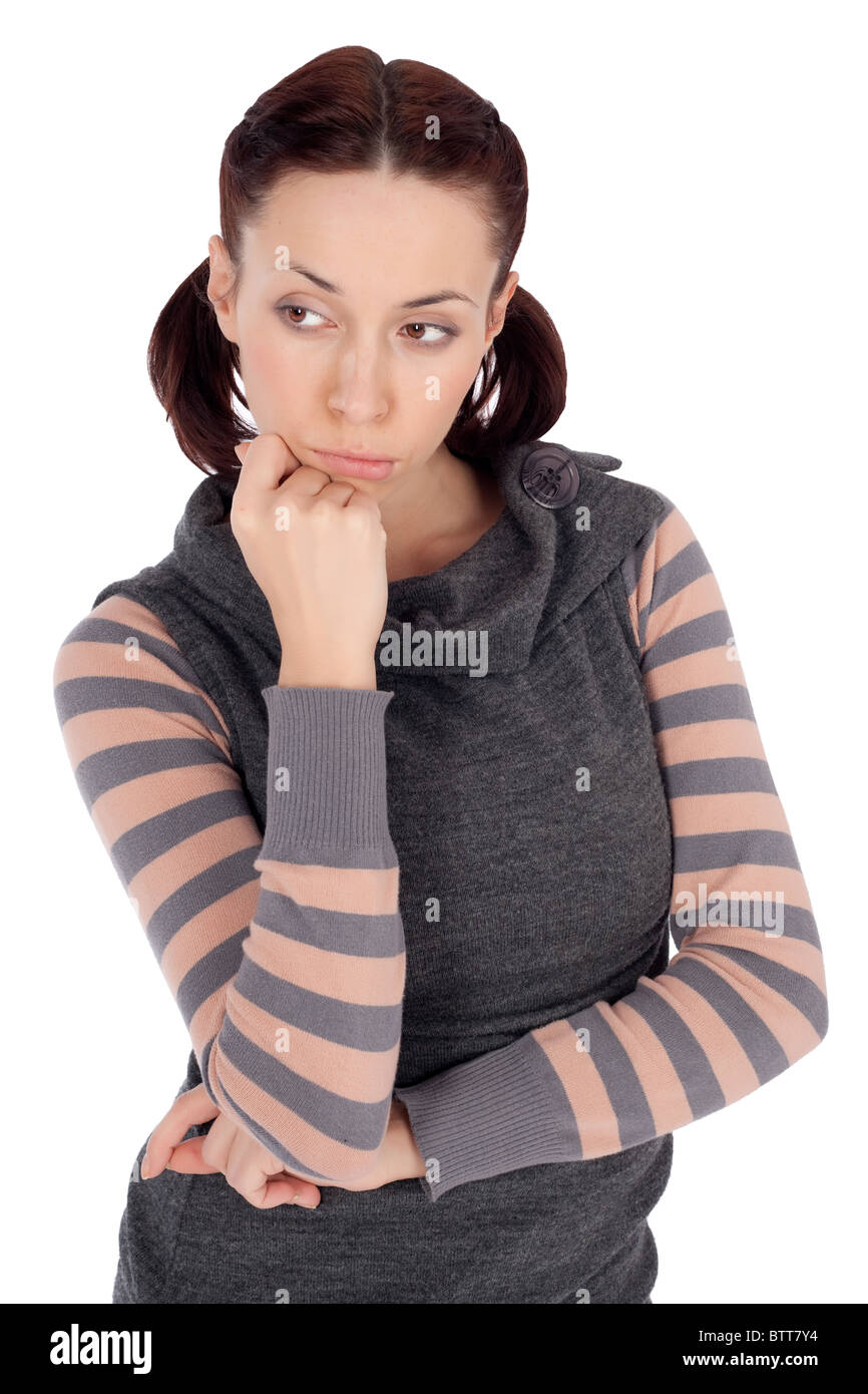 Young woman in casual clothing and sad thoughtful pose, isolated on white background. Stock Photo