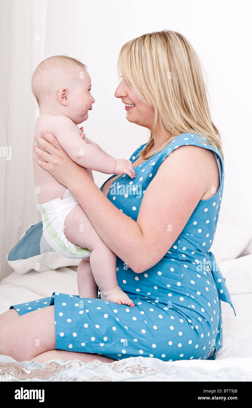 Mother And 5 Month Old Baby Boy Baby Giggling Stock Photo Alamy