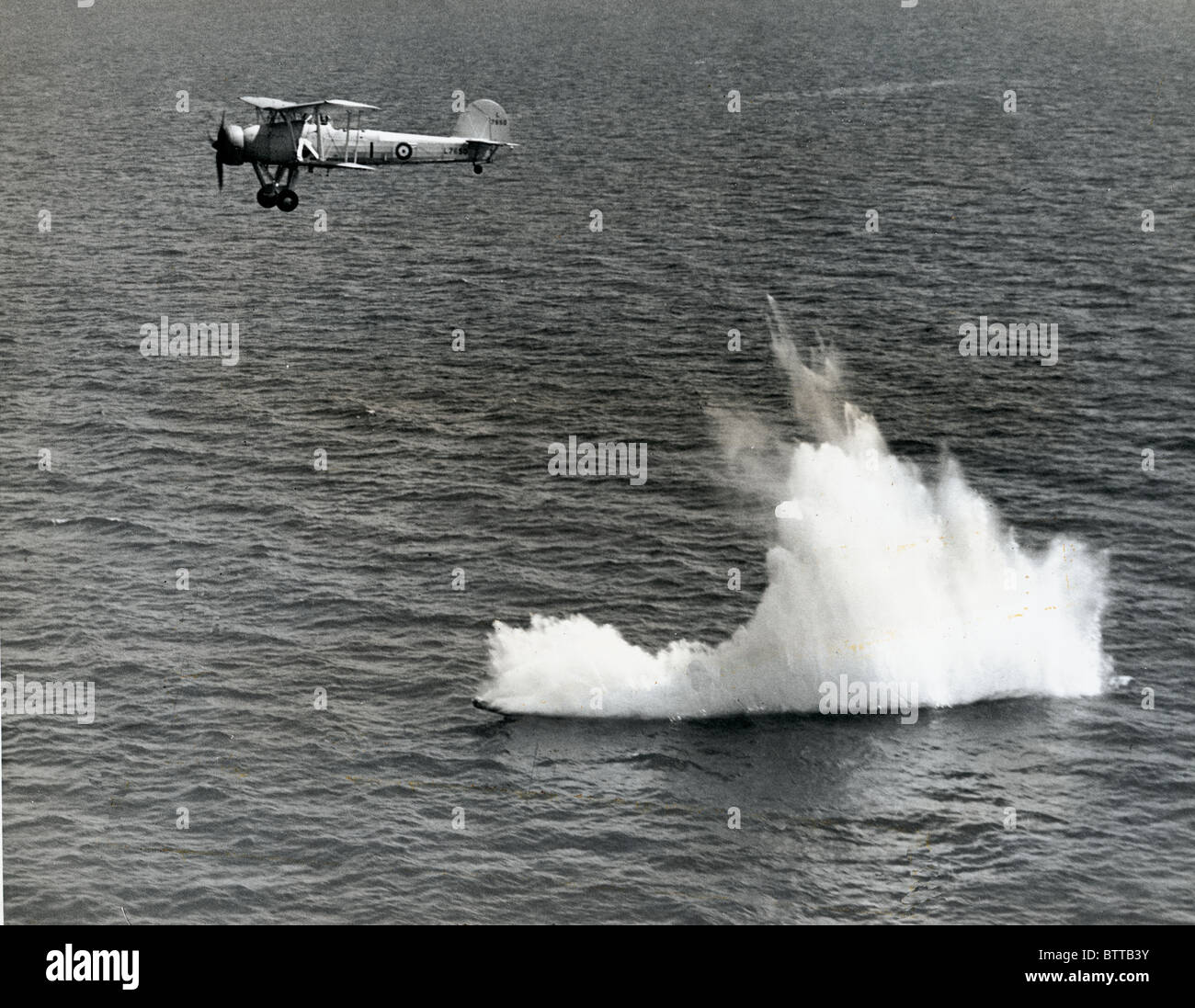 Aerial Torpedo entering the water after being launched by a Fairey Swordfish aircraft of the Fleet Air Arm Stock Photo